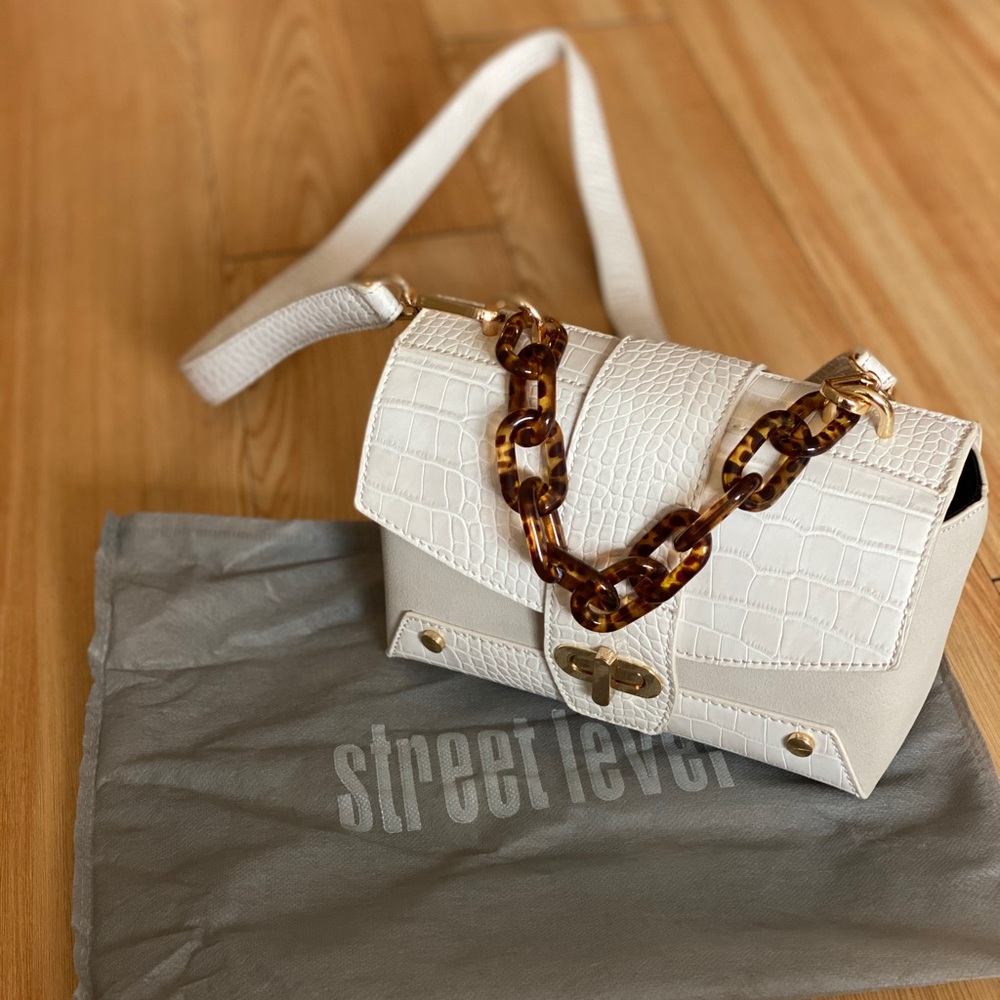 Street level beige bag. Removable straps.